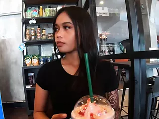 Starbucks coffee berth with Asian teenager